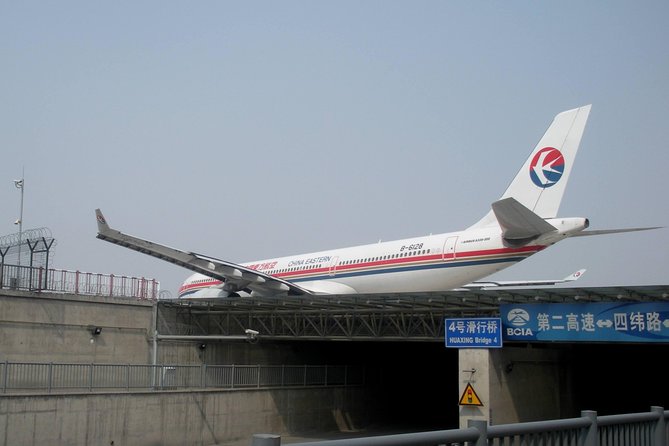 Beijing Capital International Airport Transfer: Airport (PEK) to Hotel Roundtrip - Booking, vouchers, and cancellation details