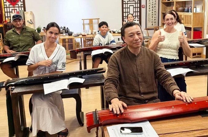 Beijing Culture: Tea Ceremony, Heritage Instrument & Calligraphy - Traditional clothing and the setting