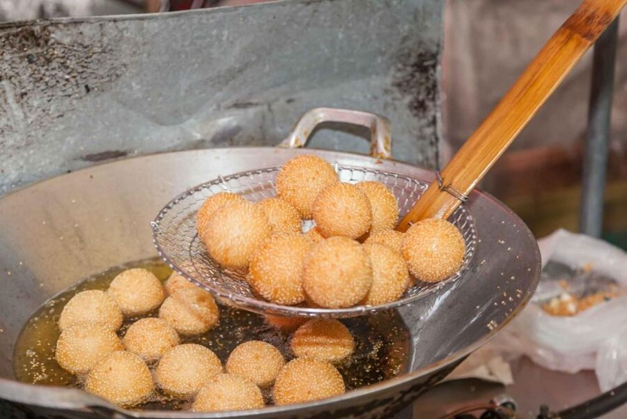 Beijing: Hutong Culinary Walking Tour with 15+ Tastings - Sesame cakes, fried dough, and the sweet side of Beijing