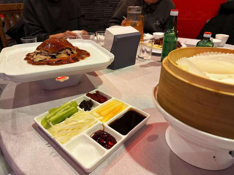 Beijing Hutong Food Crawl Delights: Peking duck, Hotpot&More - The guides shape the evening