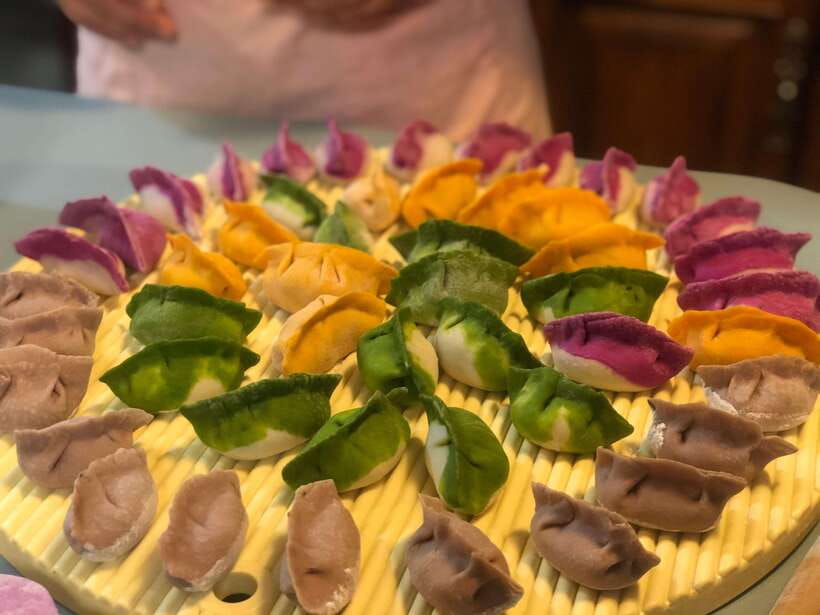 Beijing Market Tour with 10-course Family Feast - Who should book this experience?