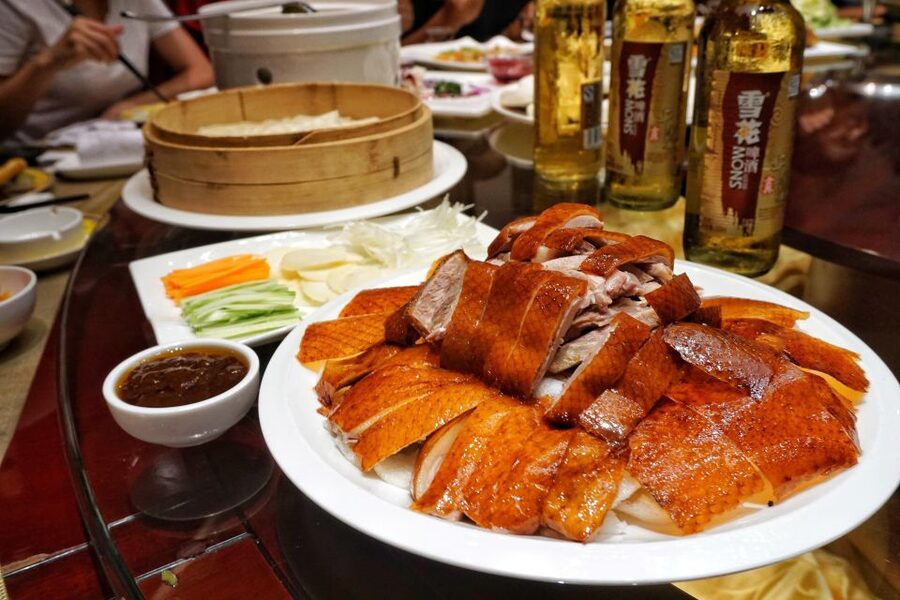 Beijing Night Tour with Acrobatics Show & PekingDuck Dinner - Peking Duck served with a bit of theater