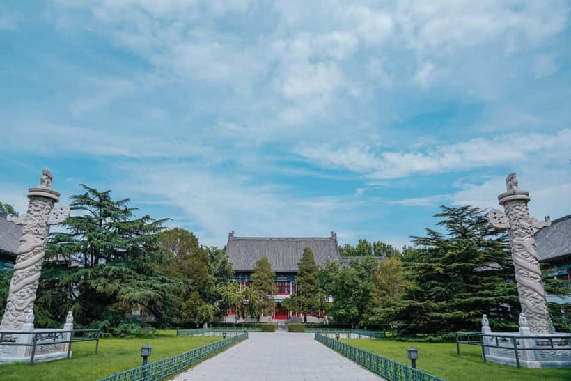 Beijing: Peking University Campus Guided Walking Tour - Bell Pavilion, Hua Biao, and Qilin statues