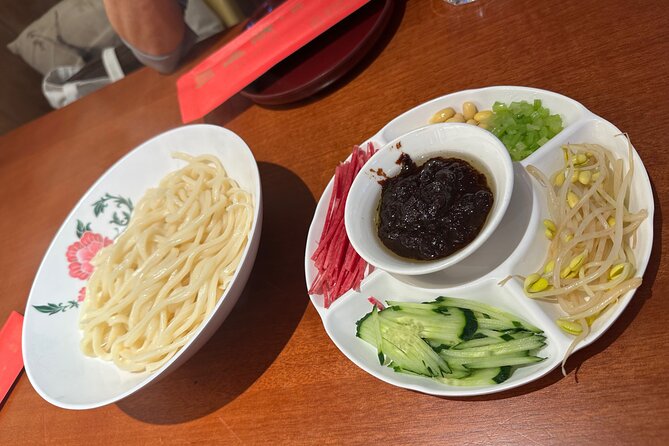 Beijing Walking Food Tour with a Local Friend - A guide who adjusts the experience to your table