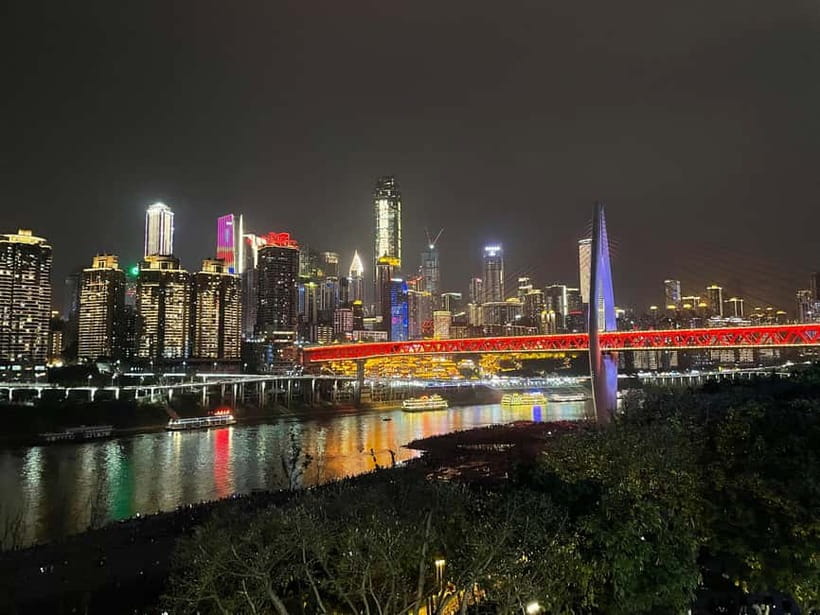 Chongqing Night Tour: River Cruise and Hidden Views - Nine language options and a local guide