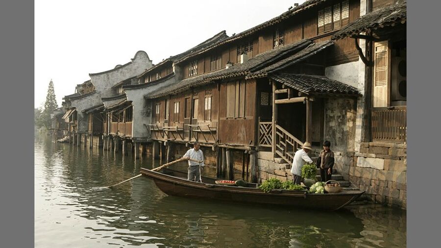 Delve into Wuzhen Water Town: Private Tour from Shanghai - The canal boat ride is the quiet highlight