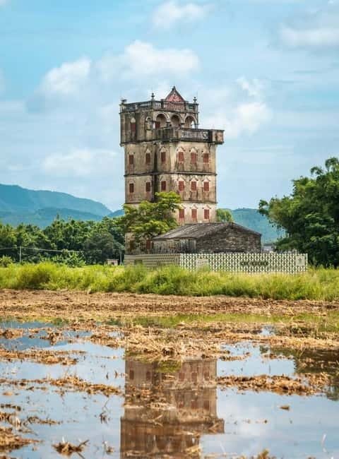 From Guangzhou: UNESCO Watchtowers & Ancient Villages Tour - Li Garden and a family fortune made overseas