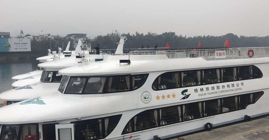From Guilin: 4 Star Luxury Li River Cruise with Buffet Lunch - Boarding the boat at Zhujiang Pier