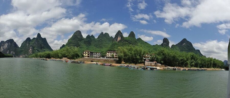 Guilin: Private Full-Day Li River Cruise and Liusanjie Show - The Liusanjie show beneath the hills