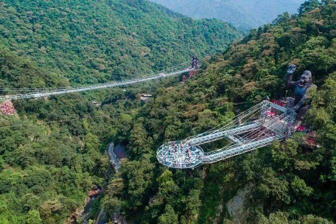 Gulong Gorge Skywalk Glass Bridge and Amusement Park Private Tour - Crossing the 99% transparent glass bridge