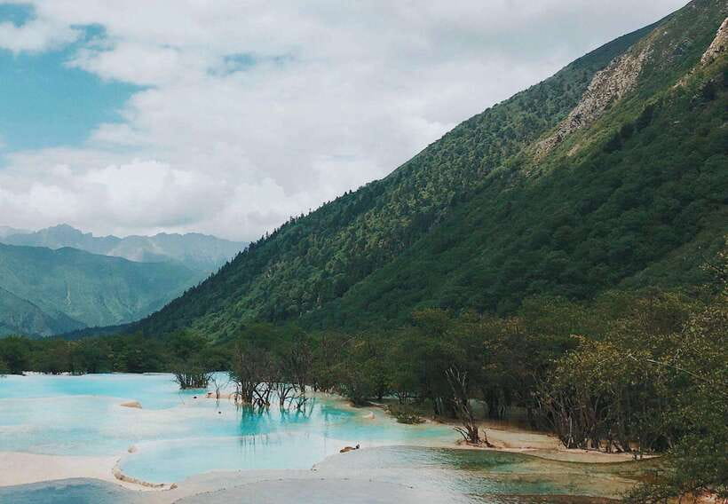Huanglong Scenic Area: Explore Stunning Five-Colored Ponds - A realistic six-hour visit