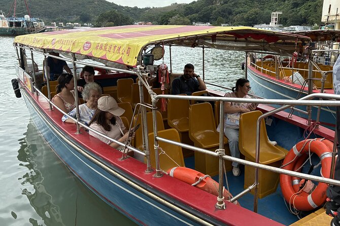 Lantau Island Day Trip: Giant Buddha & Cable Car with Pickup - Riding the Ngong Ping 360 from Tung Chung