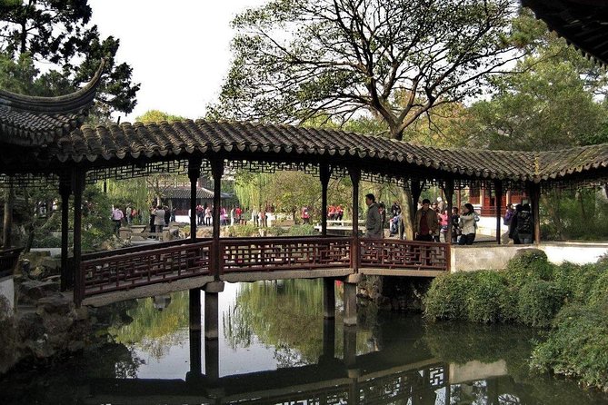 Private Flexible Suzhou City Tour with Tongli or Zhouzhuang Water Town Options - What the private guide adds