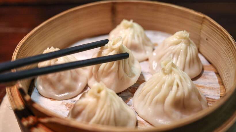 Shanghai: Evening Walking Food Tour - Shanghai’s carb course is bigger than one dumpling