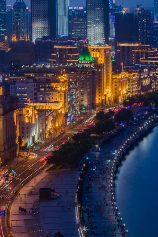 Shanghai: Night River Cruise Tour with Xinjiang Style Dining - A lively restaurant, with a few variables