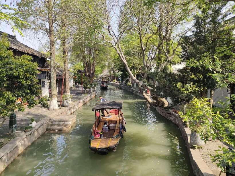 Shanghai: Zoo and Zhujiajiao Water Town Tour with Boat Ride - Transport, timing, and what the $190 price covers