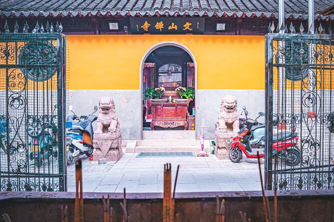 Suzhou Alleyway Walking Food Tour - Gardens, waterways, and an old Buddhist nunnery