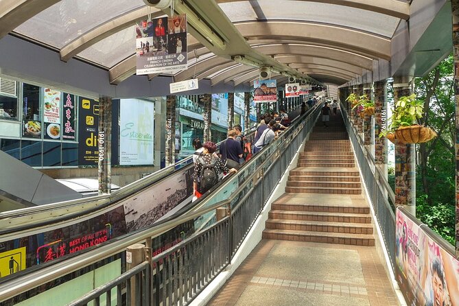 Top-Rated Hong Kong Tour: Peak Tram, Dim Sum & Cultural Sights - Riding the Peak Tram above Hong Kong