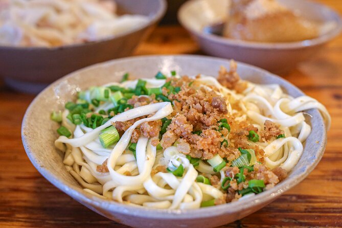 Tuktuk Food Tour Through Chengdu's Local Eats - Stop two: chaoshou and family cooking