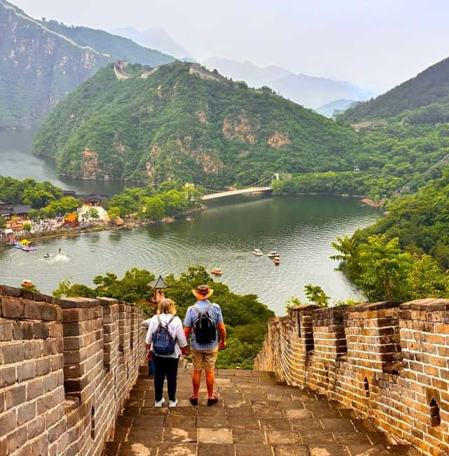 Water-Great Wall Odyssey: Hike & Cruise One Day Tour - Crossing the Dam and Taking the Included Boat
