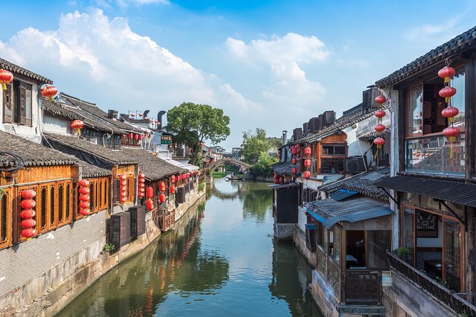 Wuzhen and Xitang Water Town Private Full Day Trip from Shanghai with Lunch and Dinner - Wuzhen: stone bridges, narrow lanes, and a boat ride