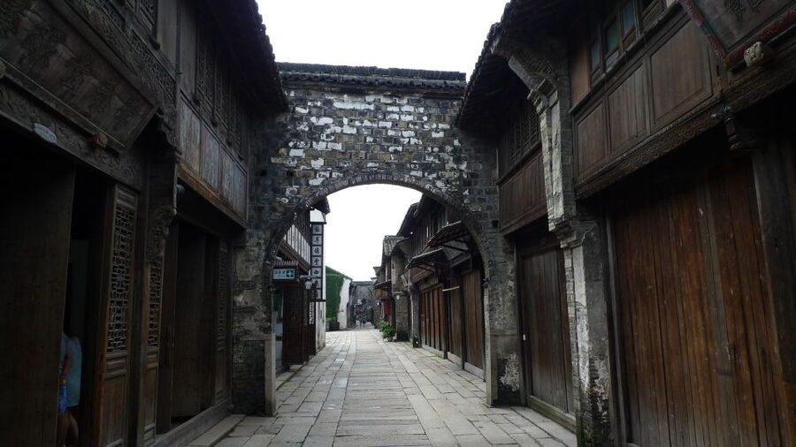 Wuzhen Private Full-Day Tour from Shanghai - Museums that show customs, family, and difficult history